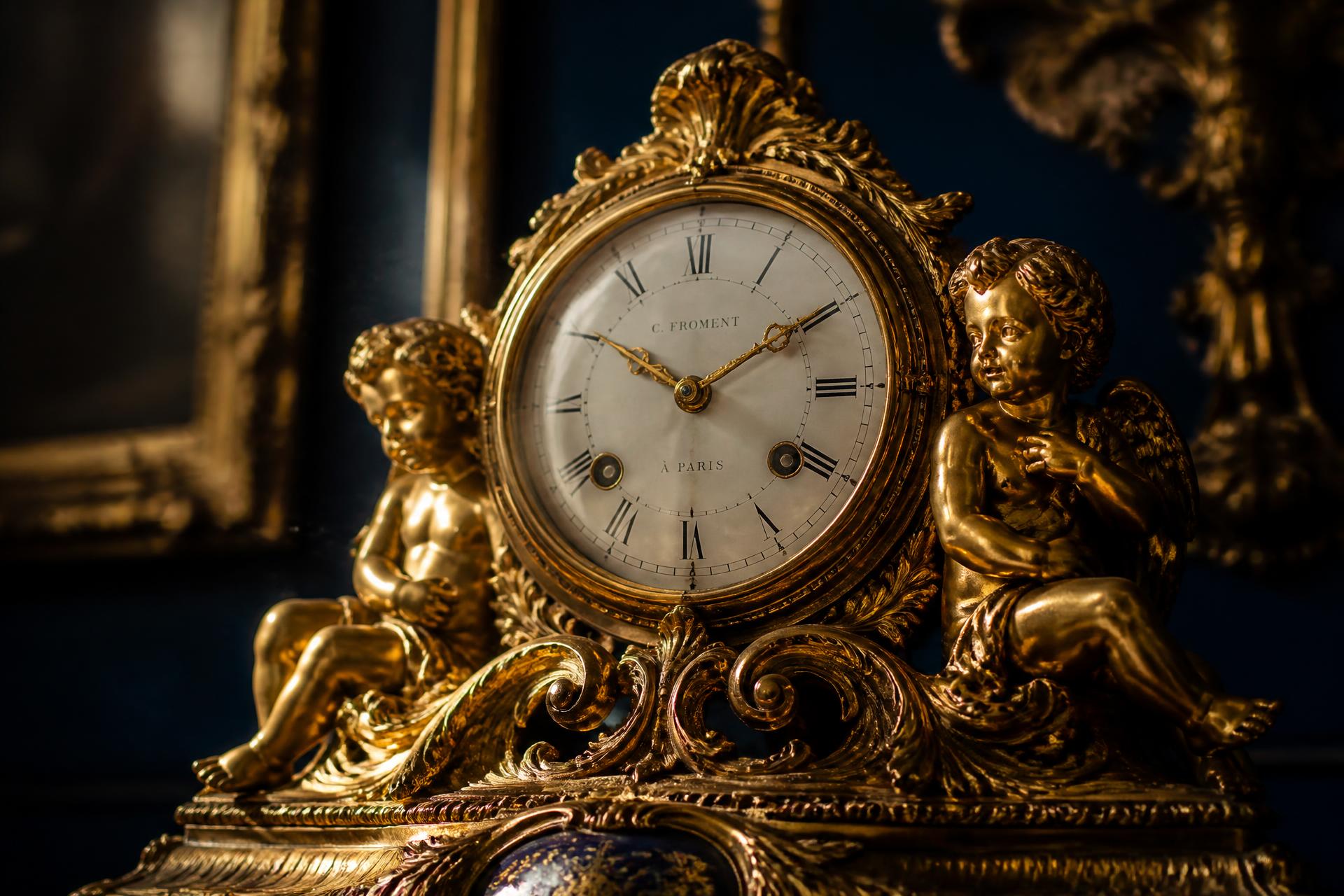 Pendule dorée aux chérubins restaurée à l'atelier